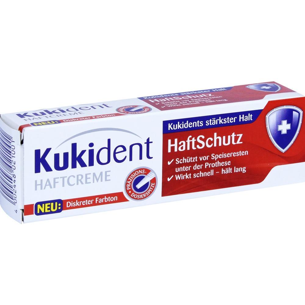 Eine Packung Kukident Haftcreme f&uuml;r Prothesen mit Haftschutz und diskretem Farbton.