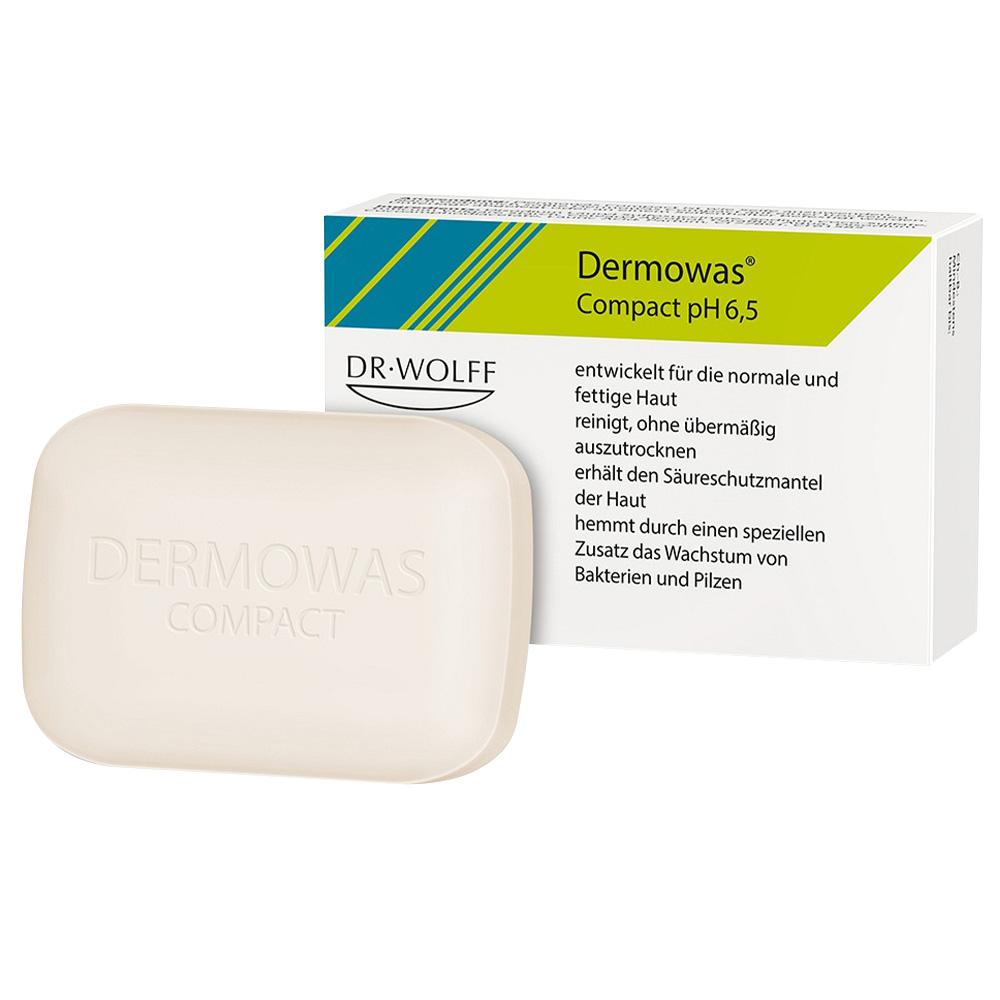 Wei&szlig;e Schachtel mit der Aufschrift "Dermowas Compact pH 6,5" und "DR. WOLFF", 100 Gramm.
