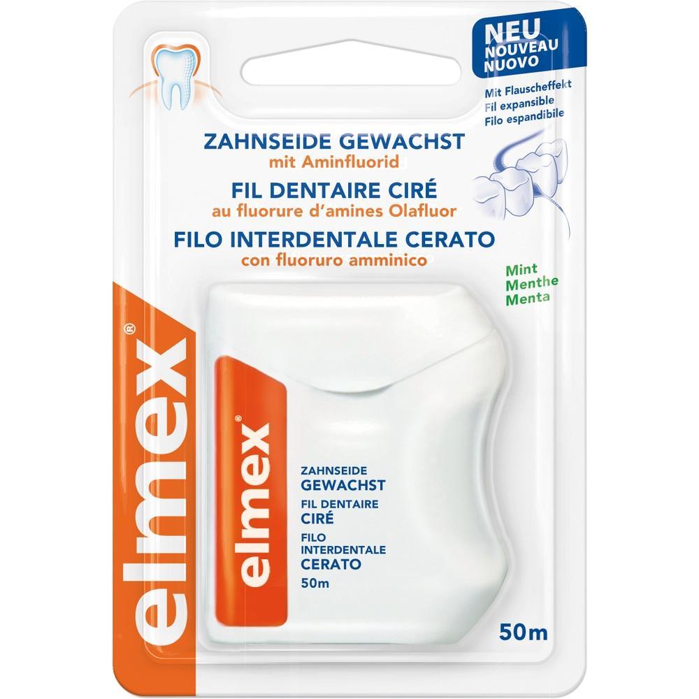 Eine Verpackung mit gewachster Zahnseide der Marke Elmex.