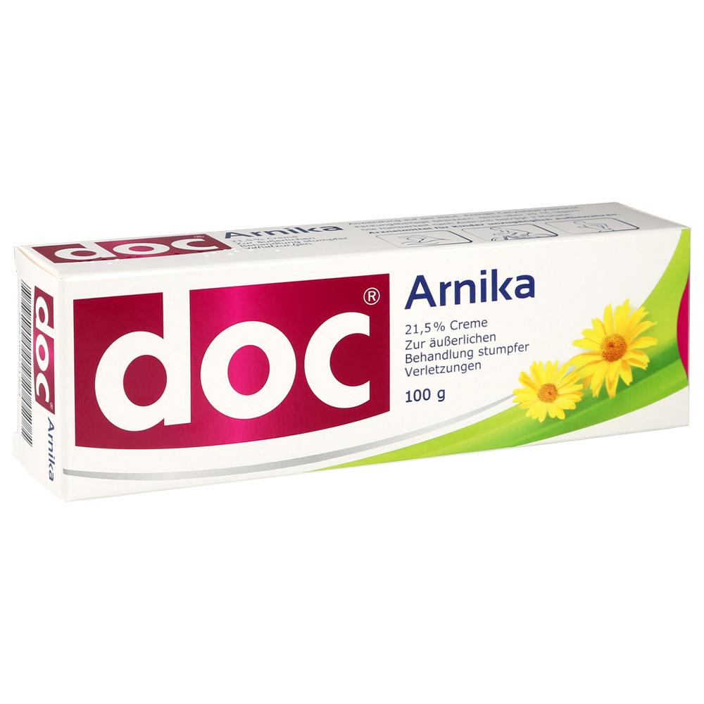 Eine Schachtel mit Arnika-Creme gegen Verletzungen zeigt gelbe Bl&uuml;ten.