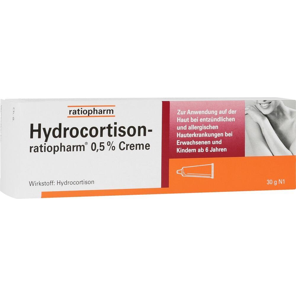 Wei&szlig;e Verpackung von Hydrocortison-Creme mit orangem Bereich und Anwendungshinweisen.