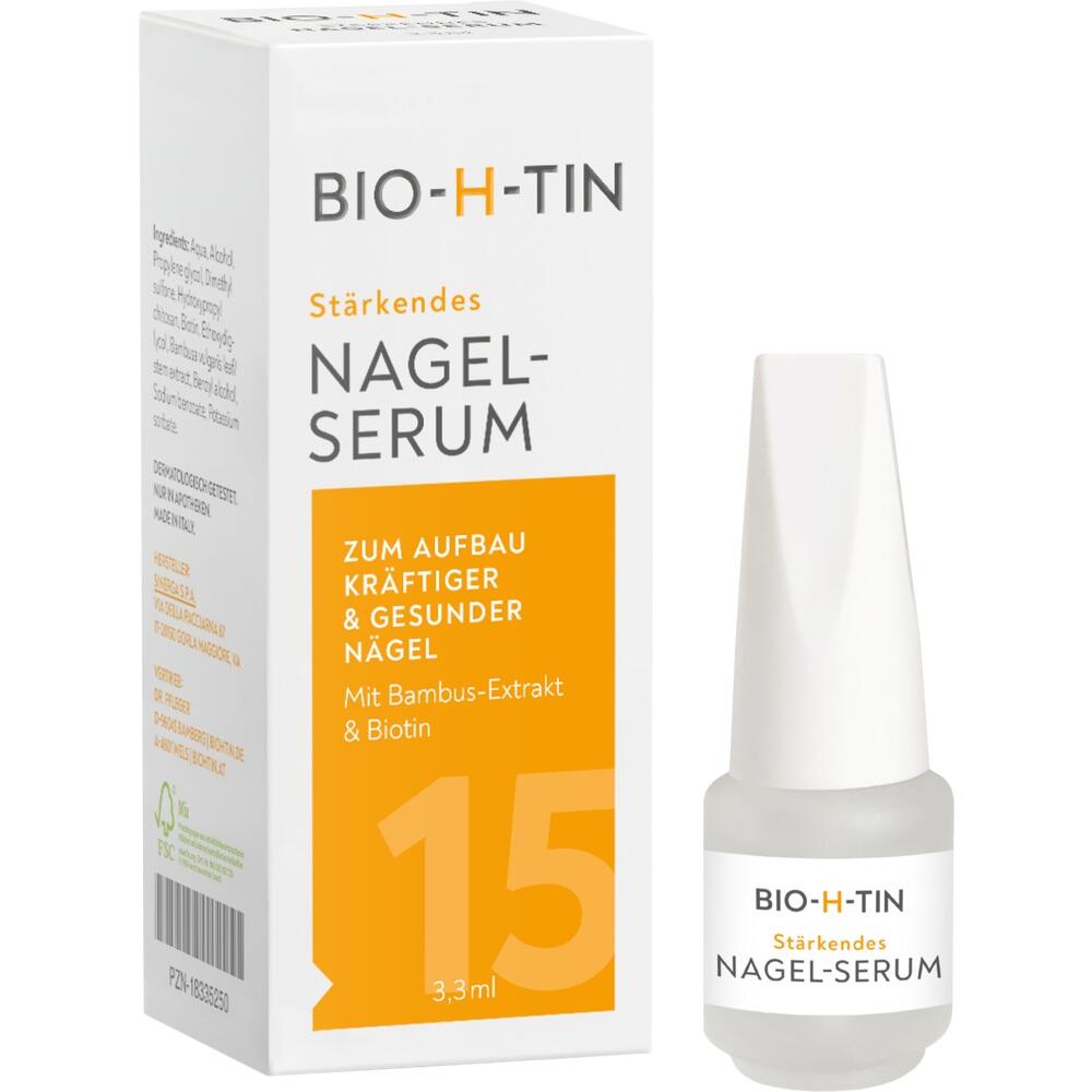 Wei&szlig;e Schachtel mit Nagel-Serum und kleinem Fl&auml;schchen daneben.